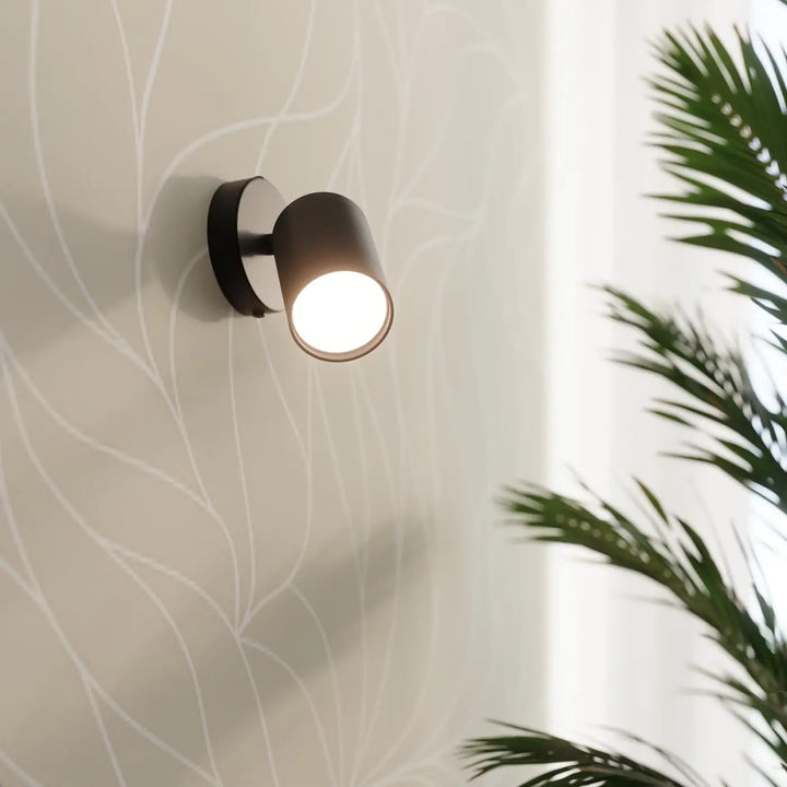 Luminaire plafonnier lemmi 2 noir avec module led cylindrique mat et tête orientable pour lumière conviviale