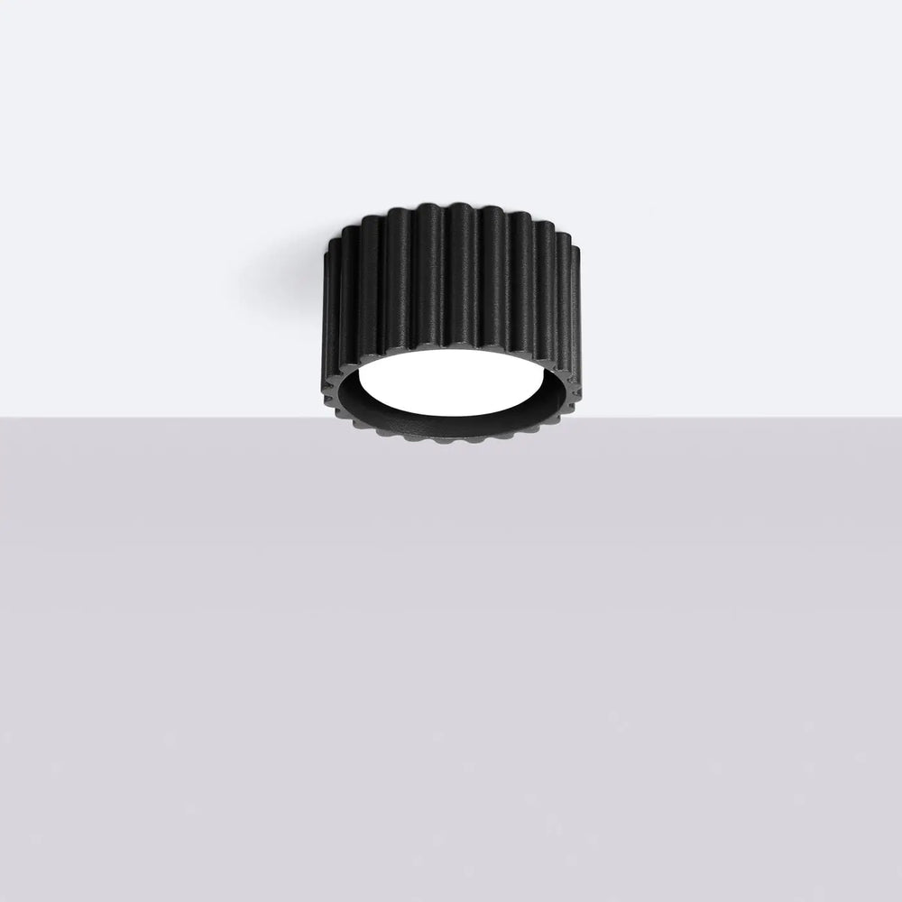 Luminaire plafonnier aura 1 noir avec forme unique inspirée, design moderne et surface nervurée en led noir