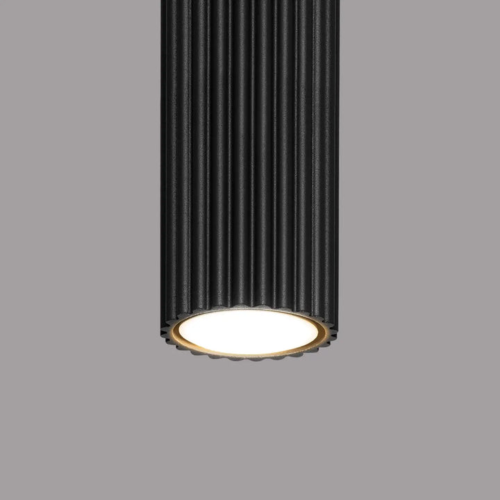 Plafonnier karbon noir design minimaliste avec ampoules gu10 interchangeables et base circulaire lumineuse blanc chaud