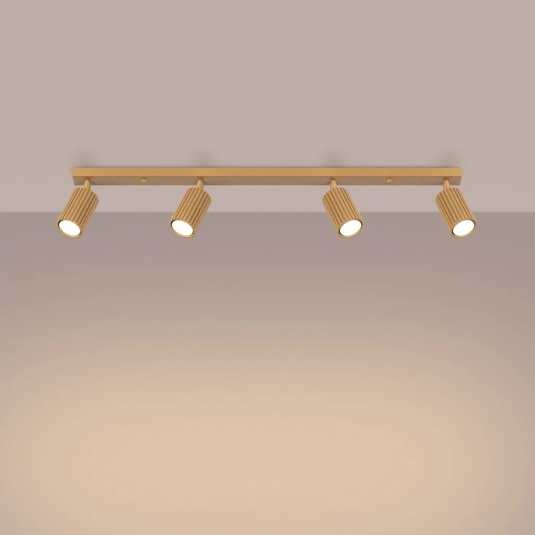 Plafonnier karbon allie avec quatre ampoules gu10 interchangeables or au design minimaliste en finition dorée