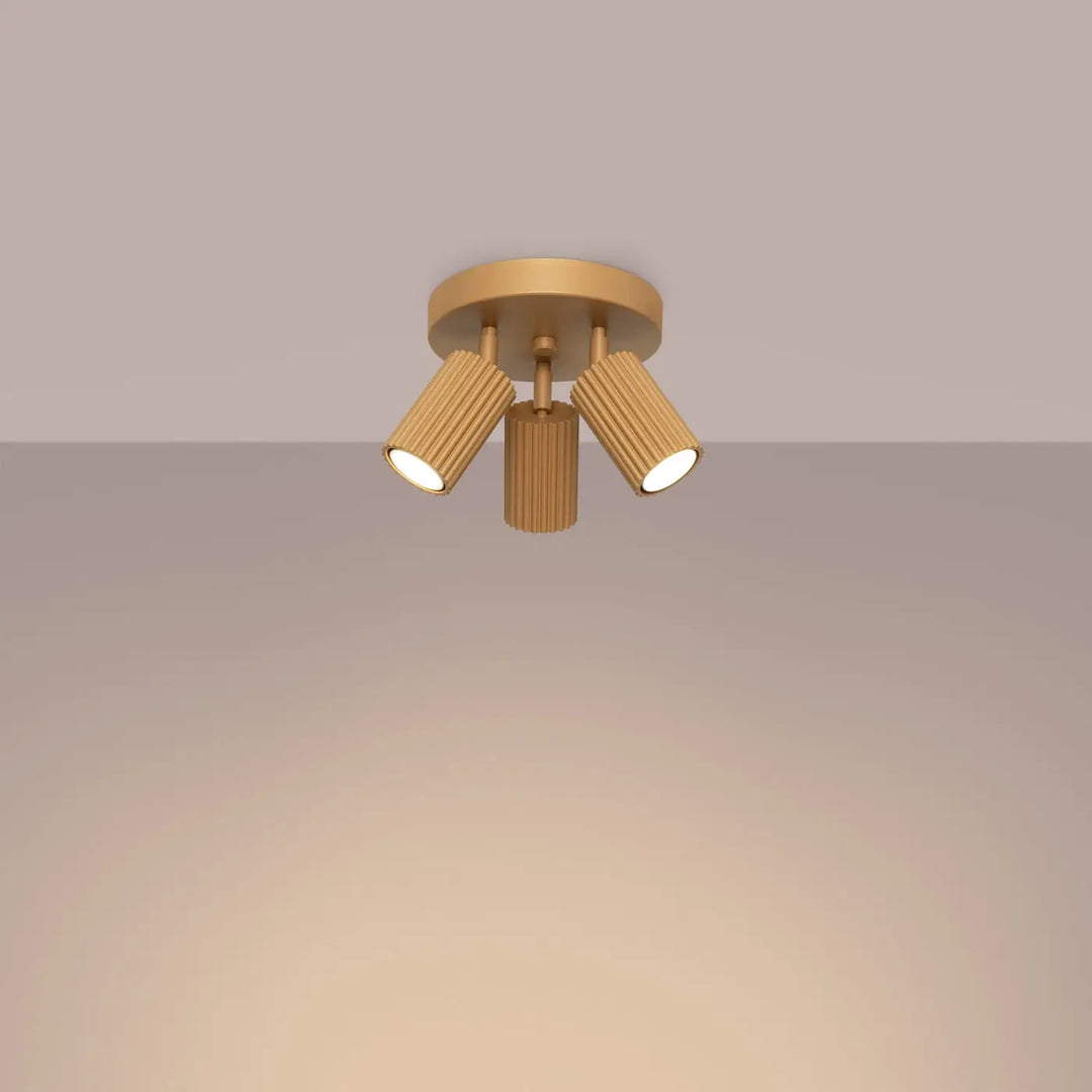 Plafonnier karbon allie or avec trois têtes cylindriques réglables et ampoules gu10 interchangeables design minimaliste