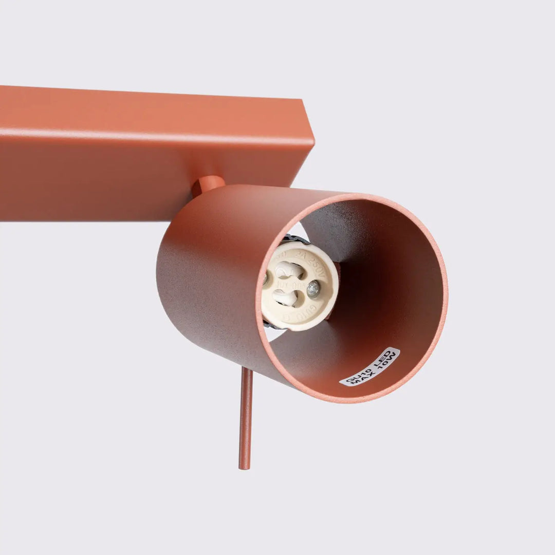 Luminaire plafonnier ring 4l rouge ochra en cuivre avec support rectangulaire et éclairage flexible minimalisme moderne