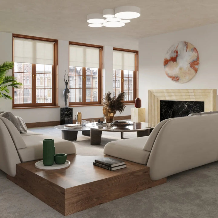 Plafonnier rond arena 45 blanc avec éclairage polyvalent et forme riche associé à un canapé sectionnel beige en tissu