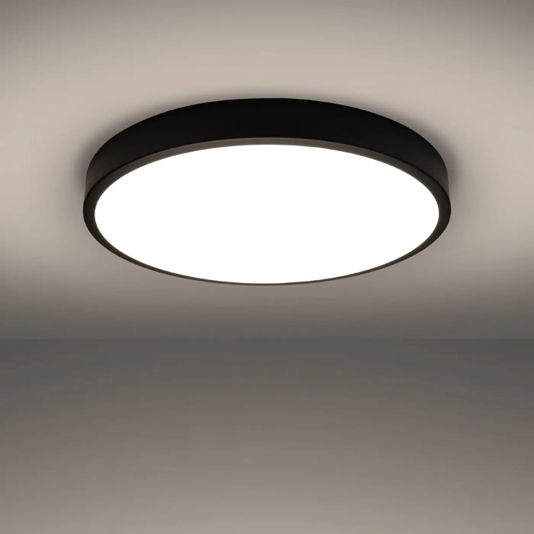 Luminaire plafonnier onyx 60 noir led 3000k plafond rond avec centre lumineux blanc pour recherche d’un éclairage moderne aux couleurs intemporelles