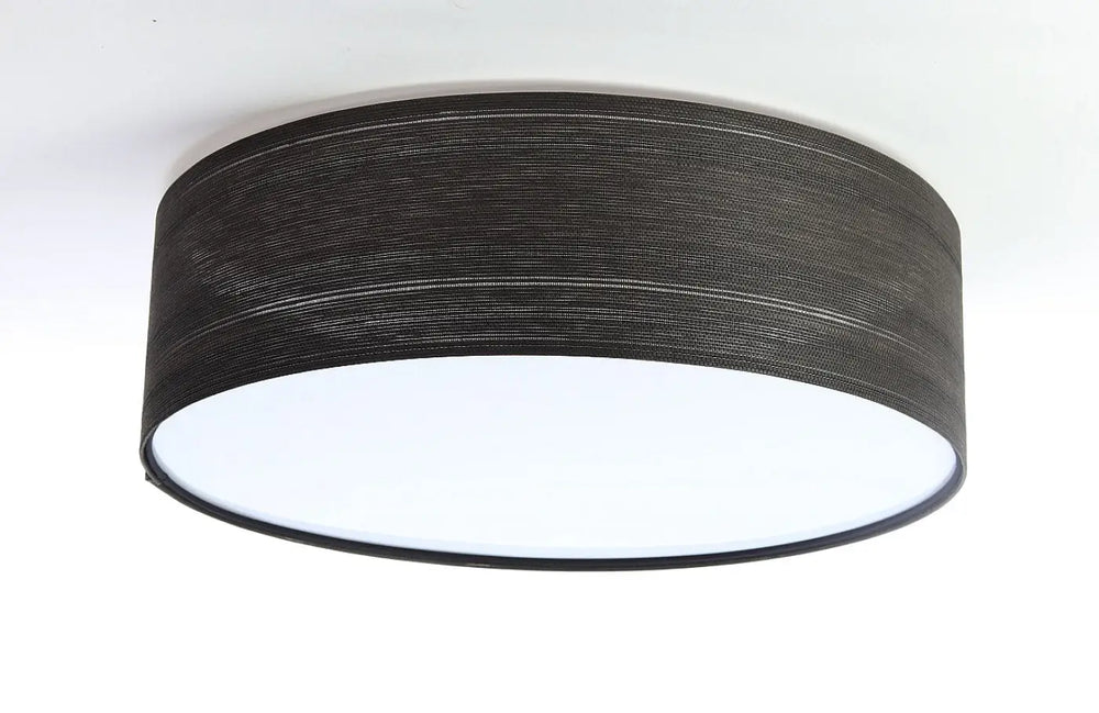 Luminaire plafonnier rond en tissu noir avec texture cylindrique moderne pour éclairage intérieur design