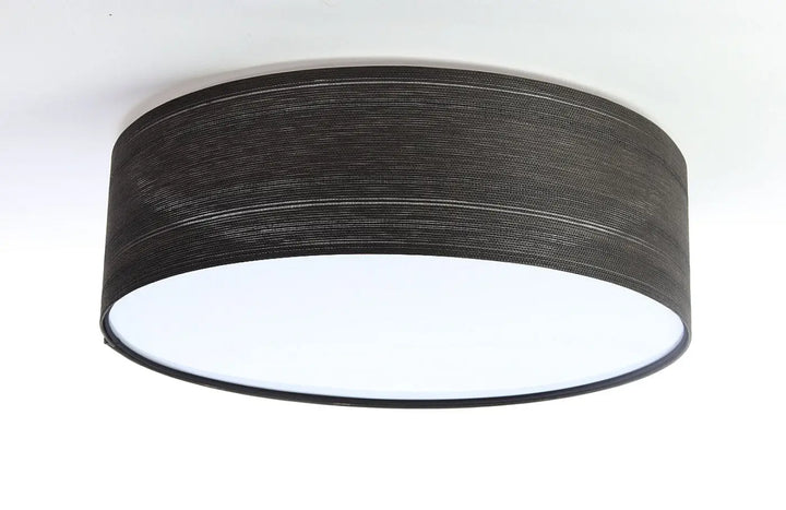 Luminaire plafonnier rond en tissu noir avec texture cylindrique moderne pour éclairage intérieur design
