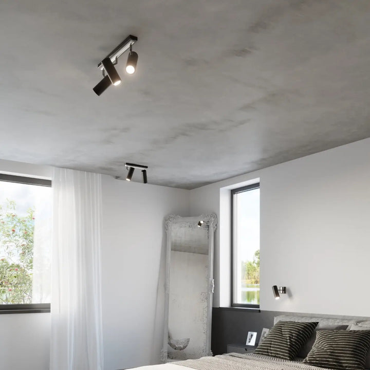 Luminaire plafonnier direzione 1 noir avec spots orientables pour éclairage élégant sur plafond minimaliste texturé