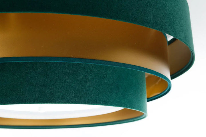 Luminaire plafonnier vert en velours émeraude avec doublure intérieure dorée pour un éclairage élégant