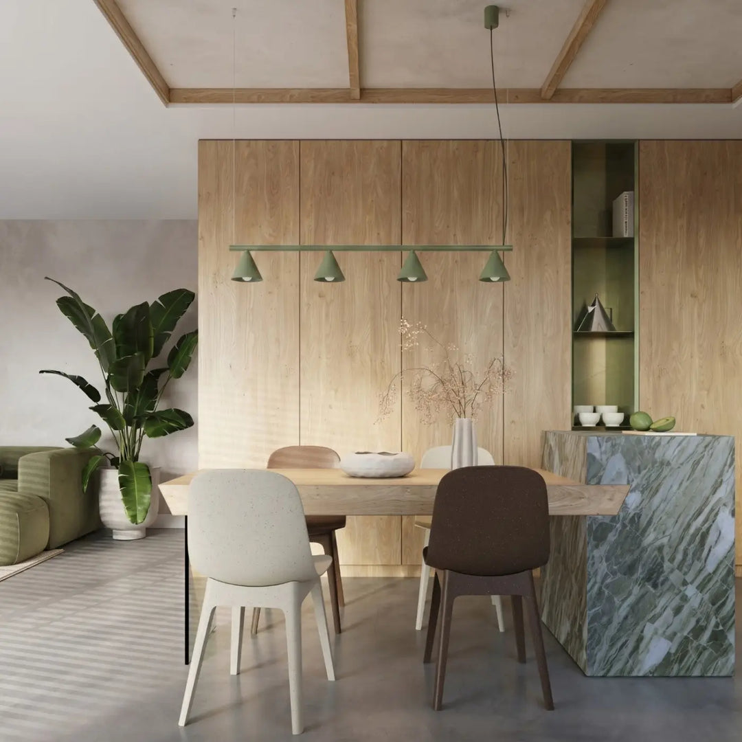 Lustre vert olive au-dessus d'une table à manger