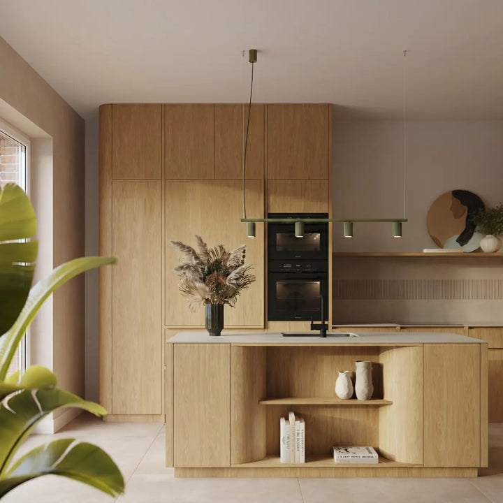 Lustre vert olive au-dessus d'un îlot de cuisine