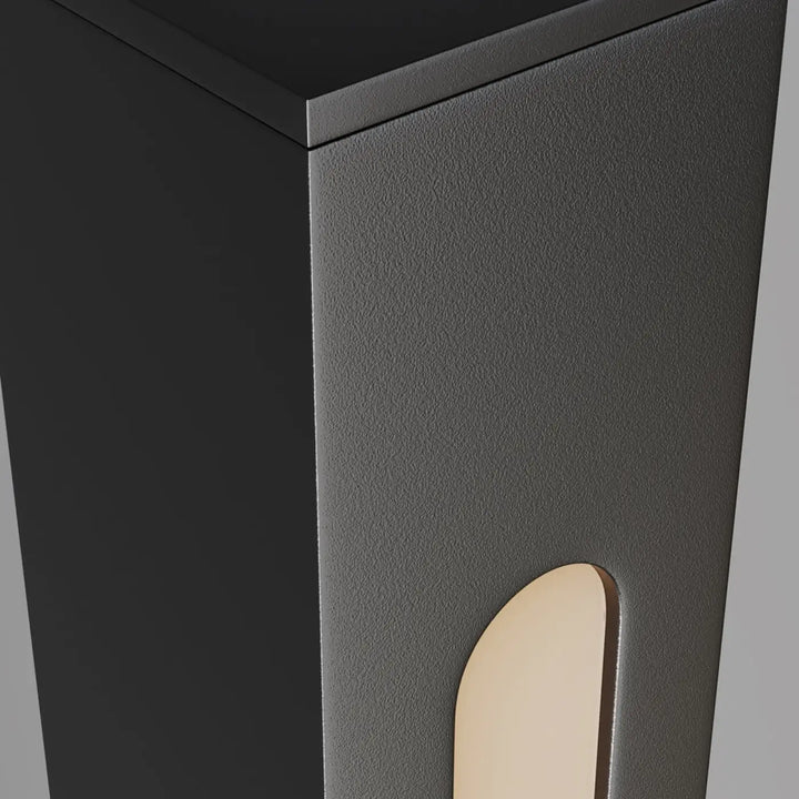 Poteau lumineux luminaire extérieur en blanc chaud avec trois hauteurs et design moderne en noir texturé avec découpe ovale