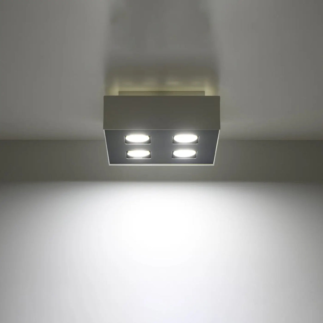 Luminaire Plafonnier blanc/noir allumée, vue rapprochée