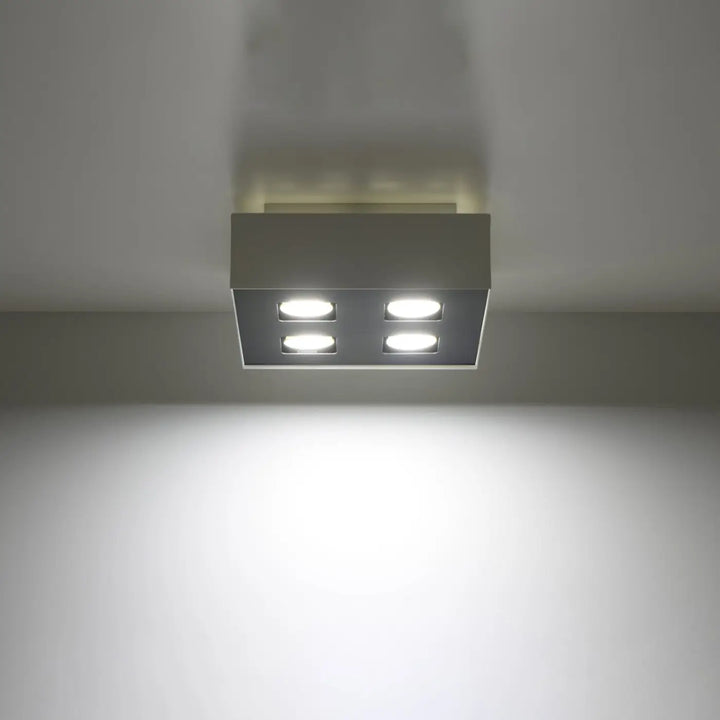 Luminaire Plafonnier blanc/noir allumée, vue rapprochée