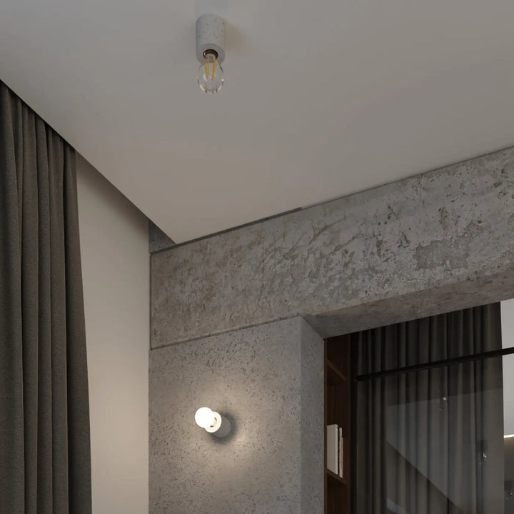 Plafonnier béton Salgado blanc minimaliste avec ampoule en verre clair et filament apparent sentez mieux