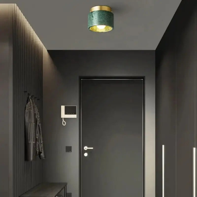 Plafonnier cylindre marbre élégant ambiance luxe blanc