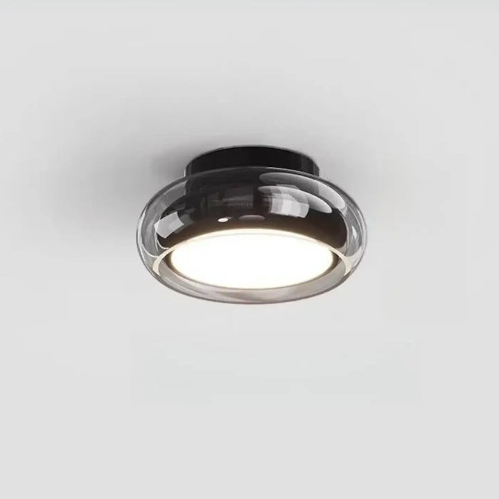 Luminaire plafonnier corine en verre ambré noir avec design circulaire moderne pour une décoration intérieure à signature visuelle forte