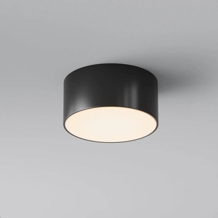 Plafonnier zon extérieur led noir cylindrique avec finition mate et lumière chaude diffuse pour luminaire plafond