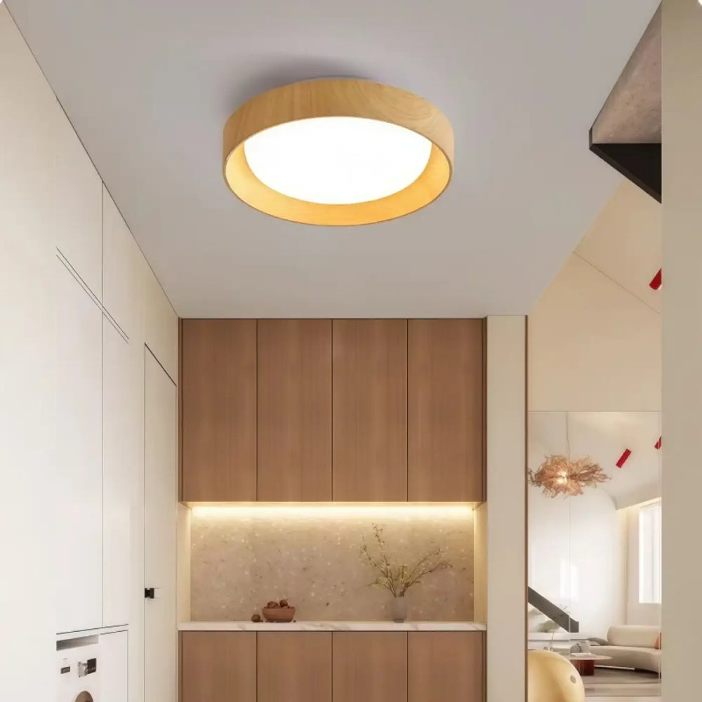 Plafonnier led circulaire coucou avec cadre en bois style nordique et panneau central blanc diffus lumineux