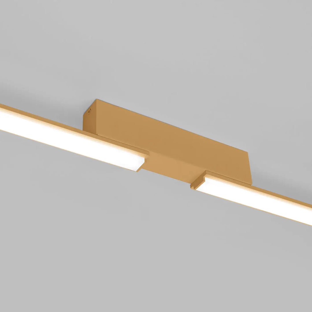 Luminaire plafonnier doré collection lagom allie design minimaliste avec deux bandes led éclaire à 4000k excellente finition