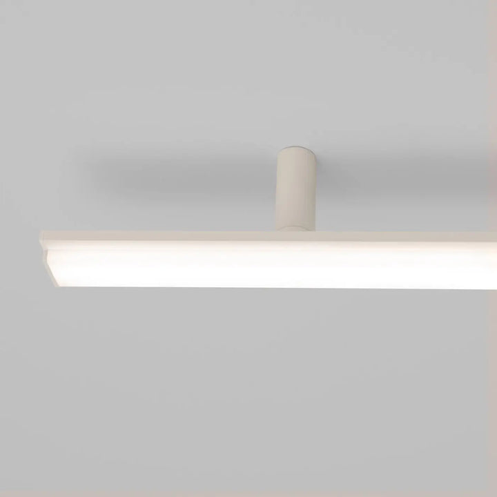 Plafonnier linéaire LAGOM beige allumée, détail du diffuseur