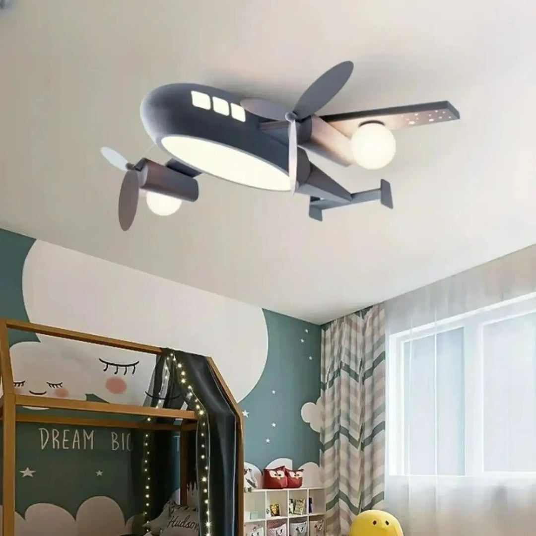 Luminaire plafonnier aeris en forme d’avion gris foncé avec lumière blanche dans les fenêtres idéal pour chambre à coucher