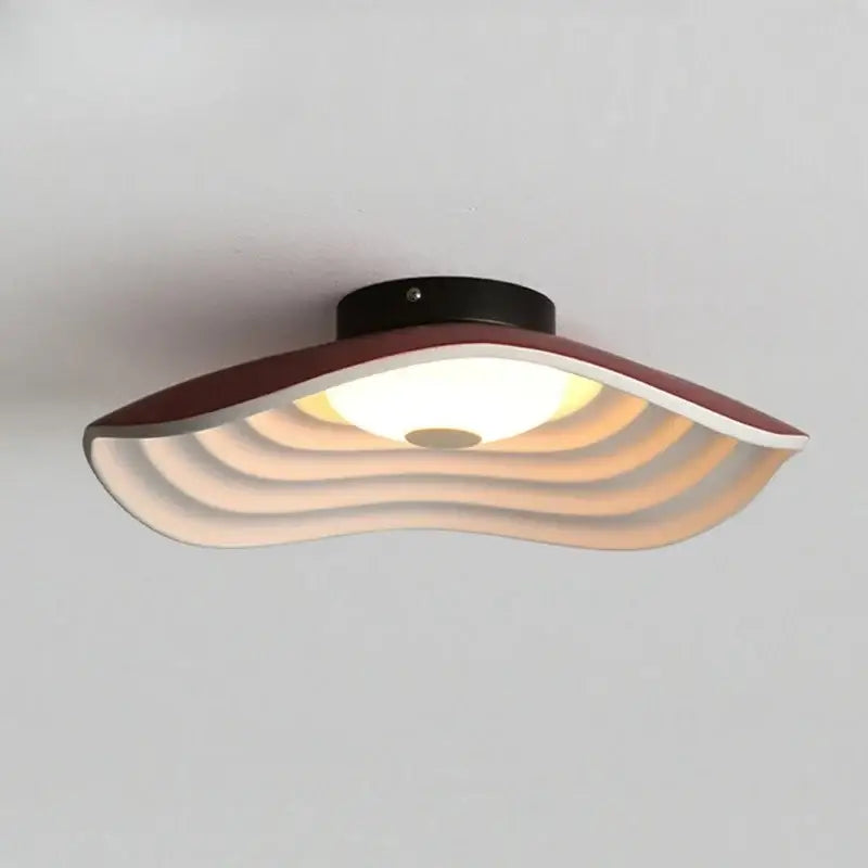 Plafonnier moderne à effet vagues avec lumière diffuse élégante
