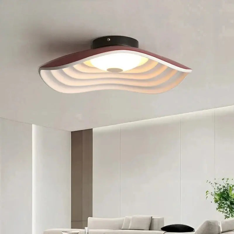 Plafonnier moderne à effet vagues avec lumière diffuse élégante
