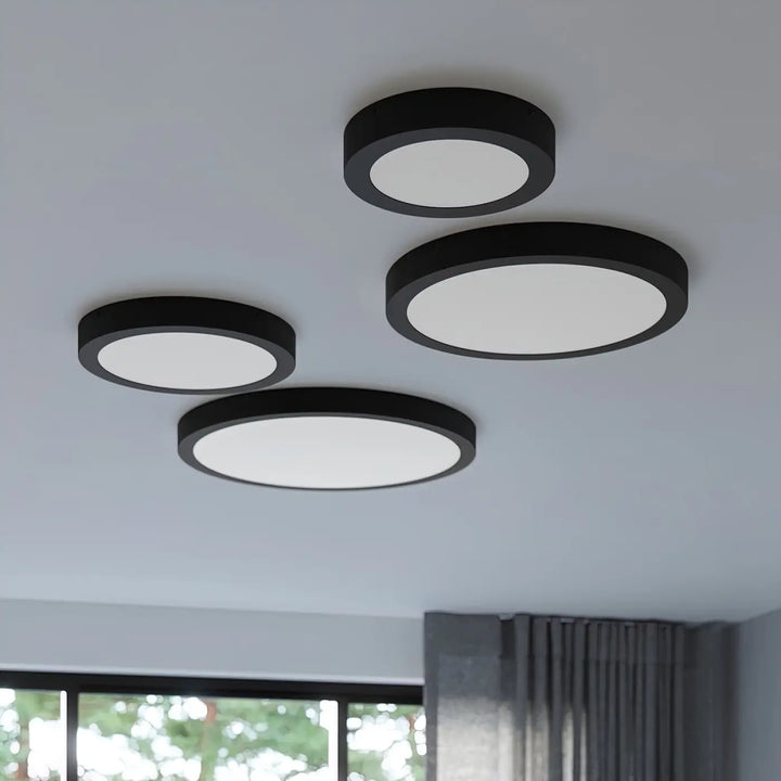 Luminaire plafonnier onyx 40 blanc led 3000k avec plafonnier rond noir pour une recherche d’un éclairage aux couleurs intemporelles