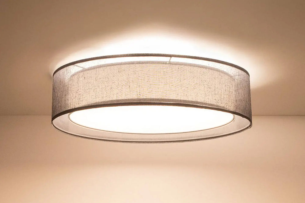 Plafonnier rond graphite avec abat-jour en tissu gris texturé et cadre métallique élégant luminaire plafonnier puro graphite