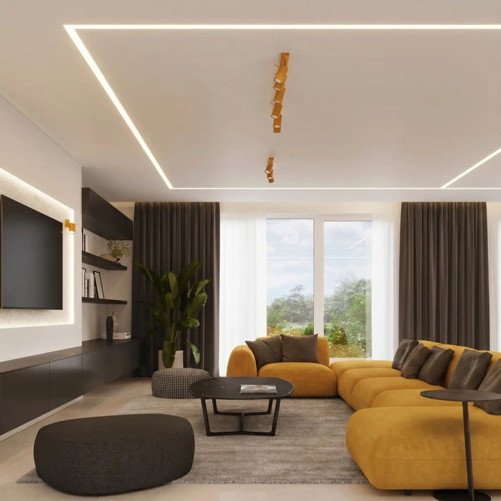 Plafonnier Ring jaune à rampe de spots orientables dans un intérieur contemporain