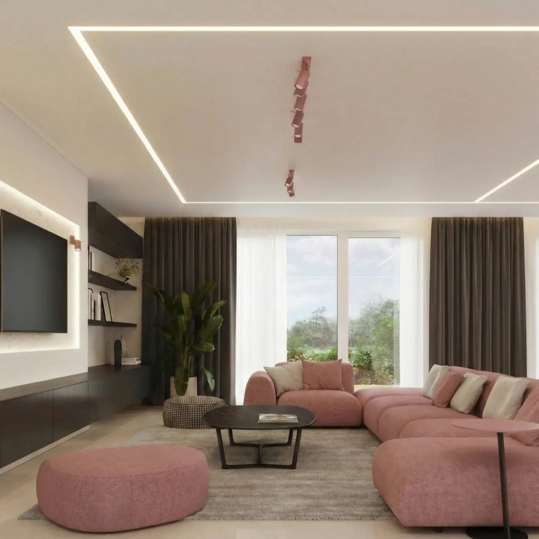 Plafonnier Ring rose à rampe de spots orientables dans un intérieur contemporain