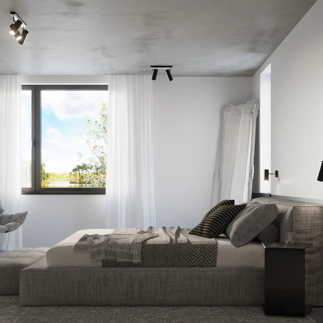 Luminaire plafonnier noir dans une chambre