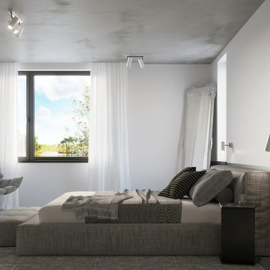 Luminaire plafonnier blanc dans une chambre