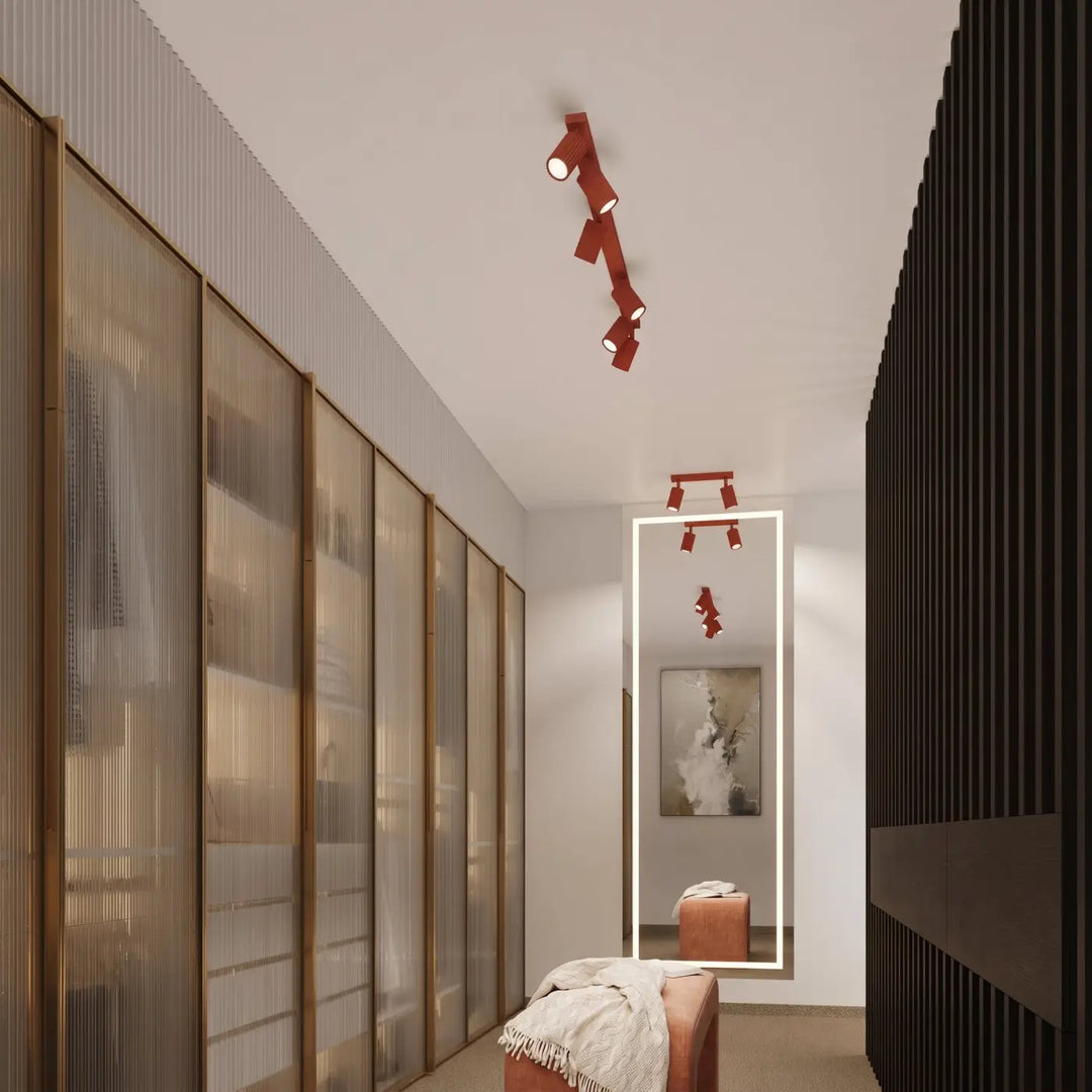 Plafonnier tube Karbon rouge en aluminium cannelé, allumé