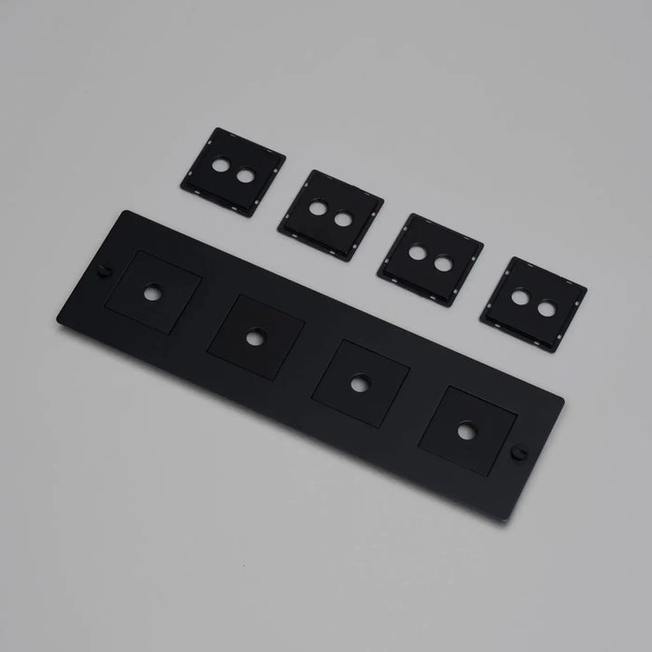 Plaque de finition Wall Plate 4 postes horizontale avec inserts, finition noire #couleur_noir