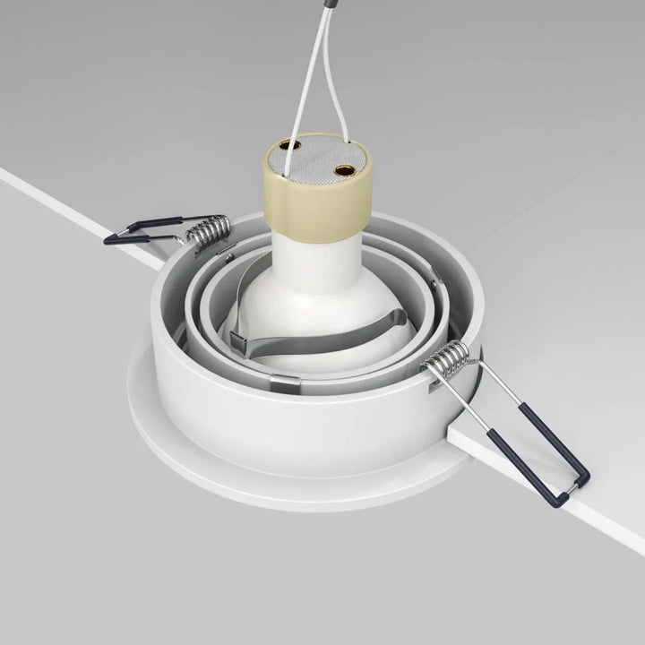 Spot encastrable rond blanc avec grille beige et clips métalliques à ressort ampoule gu10 orientable pour plafond