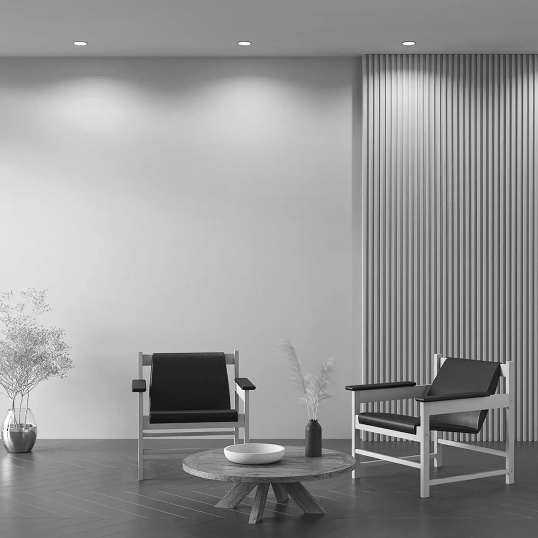 Minimalist white-framed armchairs with black leather upholstery for spot encastrable dot rond collection