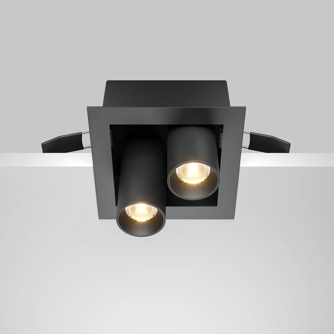 Spot magnum spot encastrable double en finition mate noire à deux têtes cylindriques avec lumière chaude intégrée