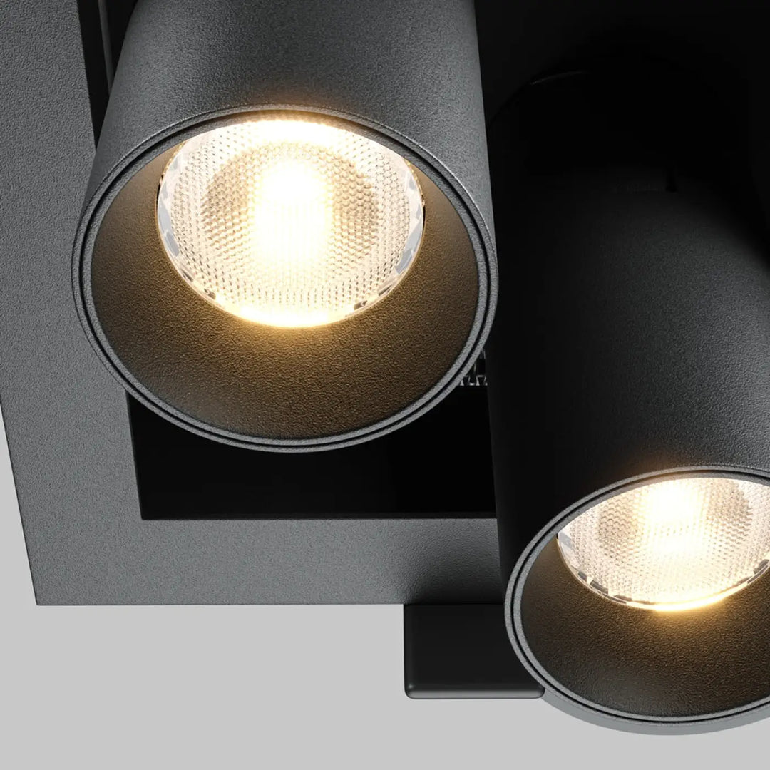 Spot magnum encastrable double noir cylindrique avec finition mate texturée et éclairage chaud focalisé