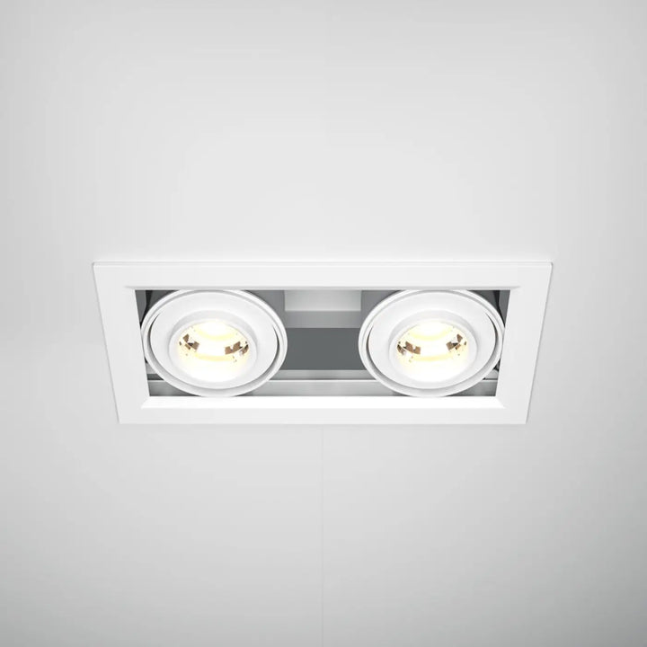 Spot metal modern double led encastré blanc avec deux ampoules led circulaires émettant une lumière chaude