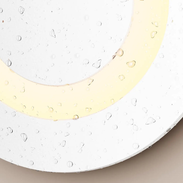 Spot encastrable limo led circulaire blanc avec anneau extérieur et cercle lumineux jaune avec indice ip65 et gouttes d’eau