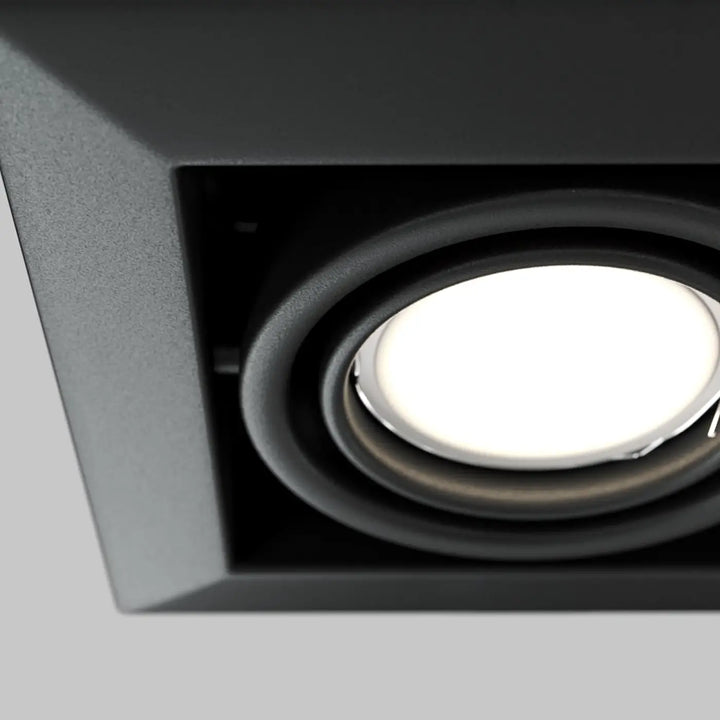 Spot metal modern carré noir en acier avec lumière led circulaire encastrée et finition mate élégante
