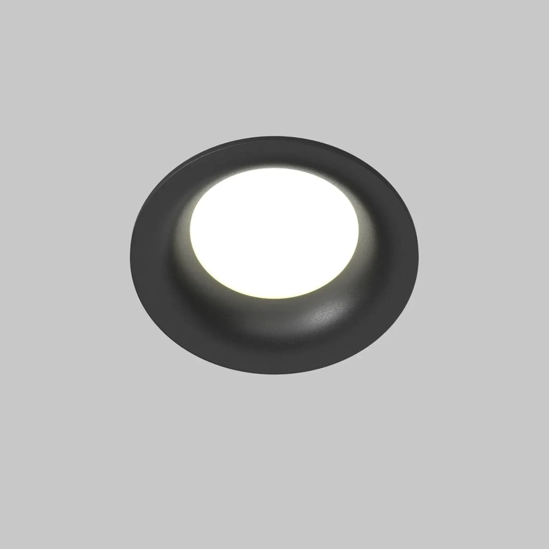 Spot encastré rond discret noir mat avec centre lumineux blanc pour éclairage général intérieur