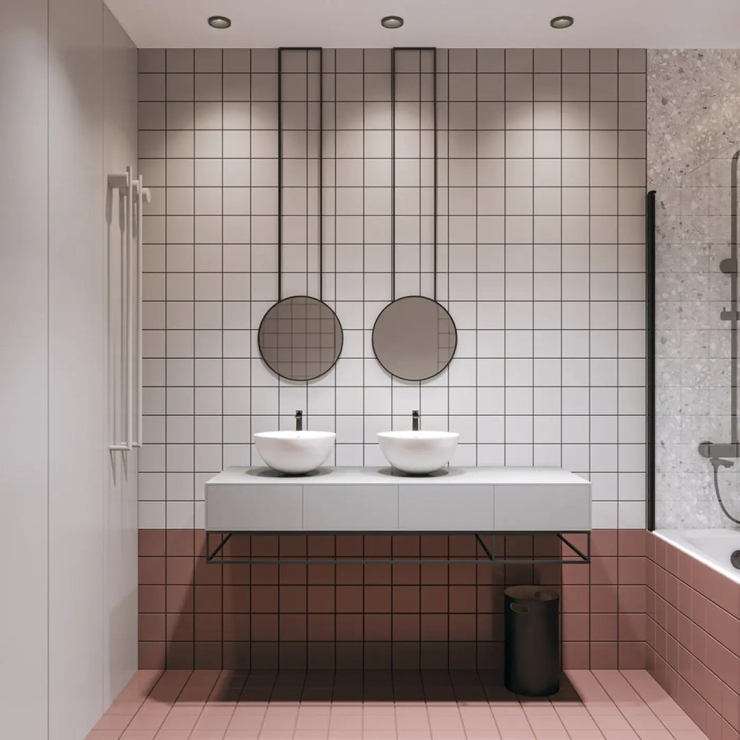 Modern white ceramic vessel sinks with sleek black faucets on a minimalist floating vanity spot zoom encastré