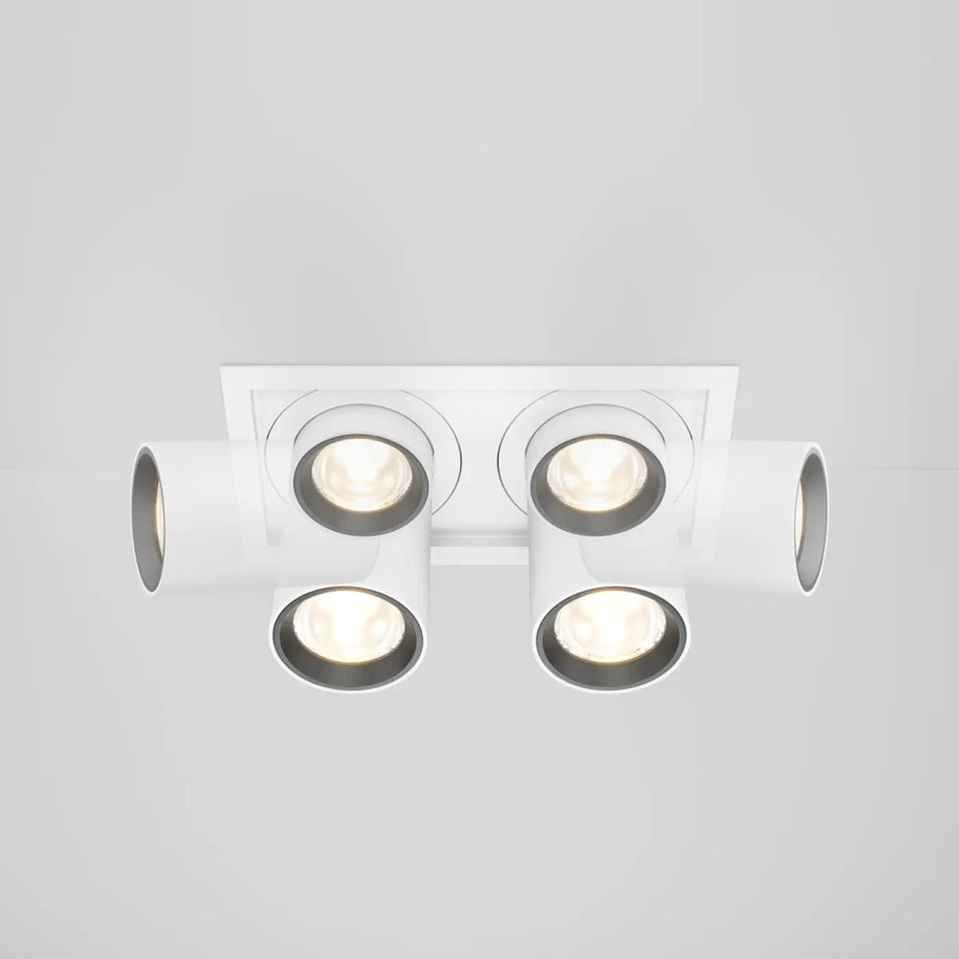 Spot hidden led rétractable en acier noir avec quatre spots ajustables à lumière chaude et design rectangulaire blanc