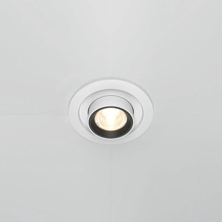 Spot hidden led rétractable en acier noir avec lumière encastrée blanche et ampoule chaude lumineuse circulaire