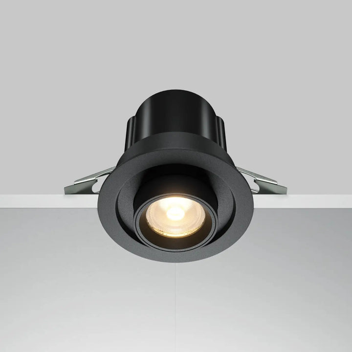 Spot hidden led rétractable en acier noir avec finition mate et fixation métallique pour éclairage encastré chaleureux