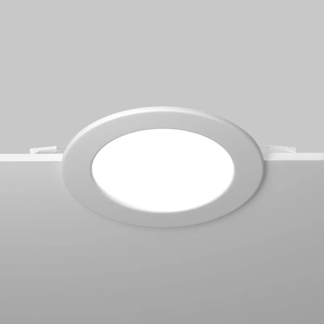 Spot stockton rond encastré en acier blanc avec design moderne et trois formats disponibles pour éclairage intérieur