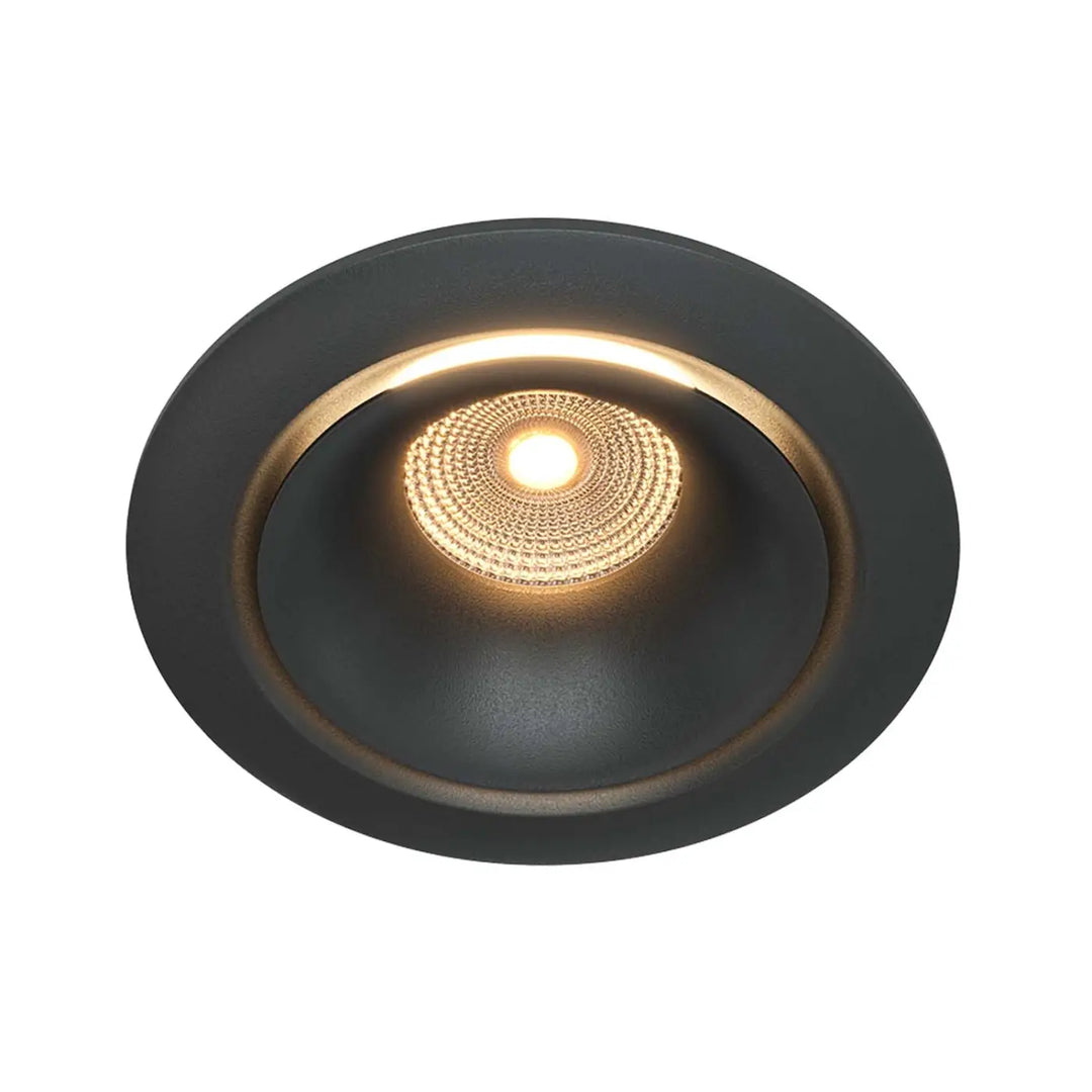 Spot yin led intégrée avec spot encastré noir, ampoule blanc chaud entourée d’une grille dorée ornée