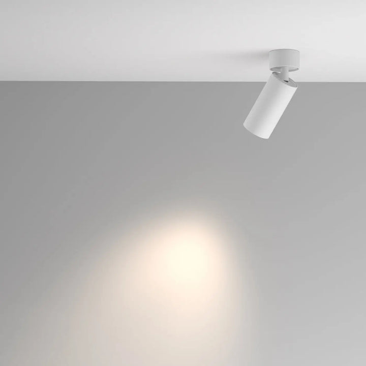 Spot orientable blanc cylindrique en aluminium texturé avec tête orientable design moderne pour plafond